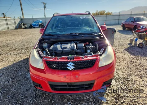 2010 Suzuki Sx4 z USA, uszkodzony, nr VIN JS2YB5A34A6300938